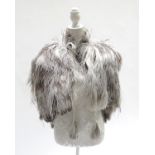 A quality 1920’s/30’s feather shoulder cape, bi- colour, cream/brown, from the female ostrich, lined