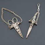 Antique Scissors: a small pair of white embossed metal chatelaine scissors, approx. 3 inches or 7.5c