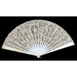 A large Mixed Brussels lace fan, the monture of white mother of pearl, c 1890’s, with shaped head, t