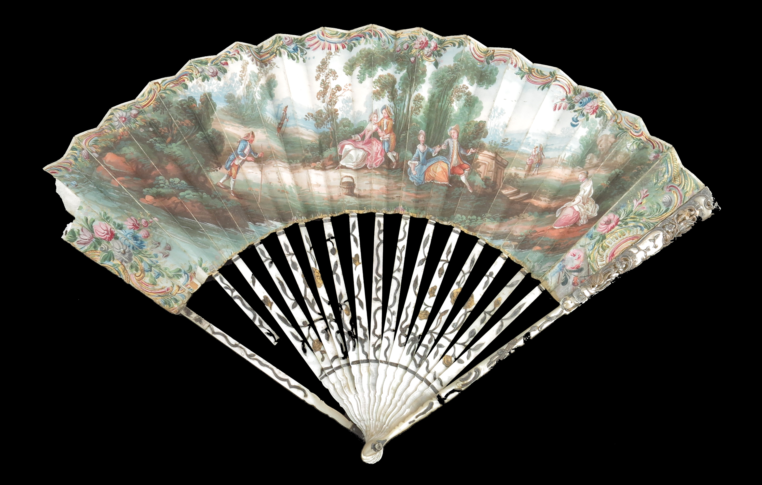 A slender 18th century fan with Mother of Pearl monture, the guards extensively carved and pierced w