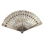 A rare silver lacquer early 19th c Chinese wood brisé fan, the 18 sticks and two guards with rounded