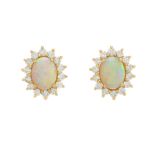 A pair of 18ct gold opal and diamond cluster stud earrings