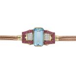 An exceptional 1940s 14ct gold, aquamarine, ruby and diamond bracelet, with fitted case