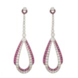 A pair of mid 20th century platinum, calibre-cut ruby and diamond drop earrings