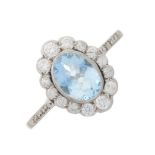 An 18ct gold aquamarine and diamond cluster ring