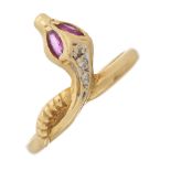 An 18ct gold ruby and diamond snake ring