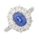 A mid 20th century platinum, sapphire and diamond cluster ring
