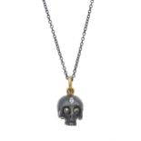 A silver and 18ct gold, diamond memento mori skull pendant, with chain