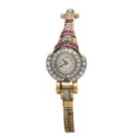 A 1940s 18ct gold diamond and ruby cocktail watch