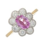 An 18ct gold pink sapphire and diamond cluster ring
