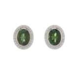 A pair of 18ct gold green tourmaline and diamond cluster stud earrings