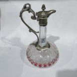 A Victorian silver plate claret jug, pierced scroll handle with monster surmount, hinged lid with