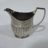 A Victorian silver helmet cream jug, Elkington & Co, London 1883, gadrooned decoration to lower body