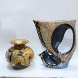 A large stylised pottery vase, and a Catteau style