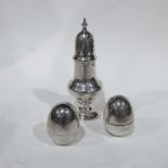 A George V silver pepper pot, Charles Wilkes, Birmingham 1927, 1.61ozt, together with a pair of