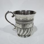 A Victorian silver fluted mug, Josiah Williams & co, London 1900, insribed cartouche and upper body,