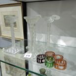 Four cut glass candleholders, 23cm high, together