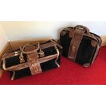 Gucci, a set of two vintage 1980s luggage bags, to include a small travel case and a large