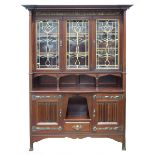 An Arts & Crafts mahogany bookcase by Shapland & P
