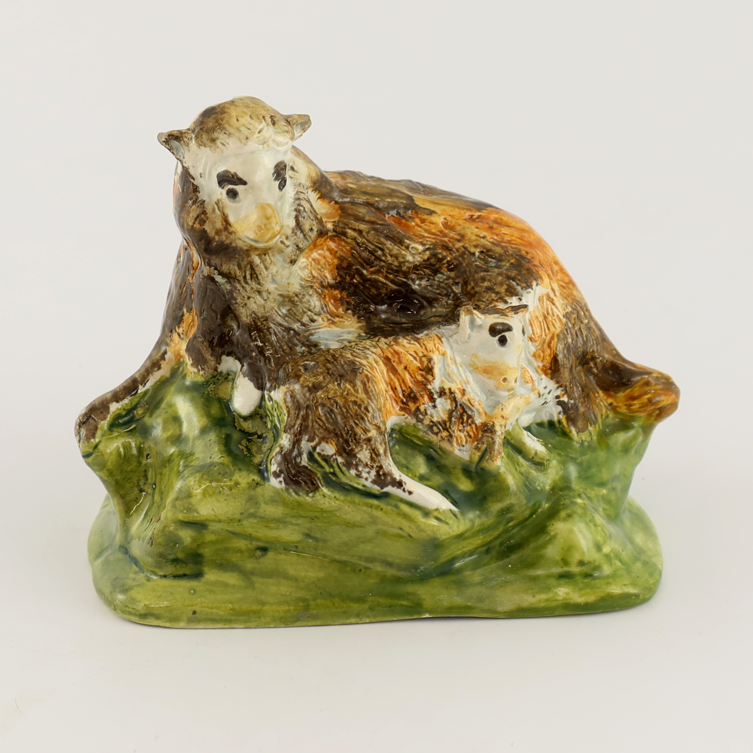 A pearlware figure of lambs and ewe