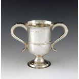 A George III Provincial silver twin handled vase o