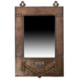 An Arts and Crafts copper and abalone mirror