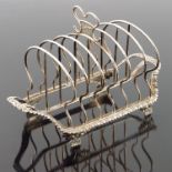 A George IV silver six division toast rack, Willia