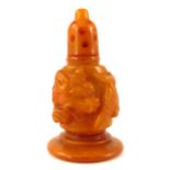 A Chinese copal amber miniature pepperette, ogee s