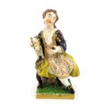 A Derby figure of a man with a cat,