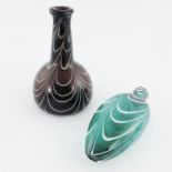 A 19th Century Nailsea type onion shaped bottle, b