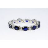 An 18ct white gold and sapphire ring