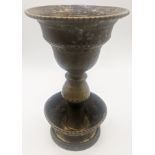 An Indian brass oil lamp or candlestick, South India, H.18.5cm