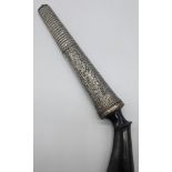 A 19th century Indonesian or Malaysian dagger (Badek), engraved silver mounts and carved horn