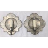A pair of early 20th century Dutch pewter wall sconces, engraved floral and butterfly designs,