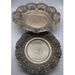 A large early 20th century Indonesian silver dish, D.29cm, together with one other Indonesian silver