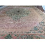 A very large Chinese part silk carpet, 434cm x 310cm, purchased by the previous owner from Harrods