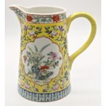 A Chinese yellow ground famille rose water jug, late 19th/early 20th century, character mark to