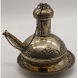 A 19th century Malay or Indonesian Islamic silver ewer and dish base, 175g, H.12cm