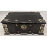 An 18th century Dutch colonial Sri Lankan ebony and silver betel box, H.8cm W.21cm D.15cm