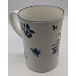 A Caughley porcelain jug, decorated with blue and white flora and fauna, moon mark to base, second