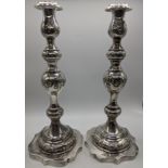 A pair of early 20th century silver candlesticks, hallmarked London, 1921-22, indistinct maker