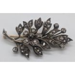 A Swedish Trembleuse gold and silver diamond floral spray brooch, mounted with 42 rose cut diamonds,