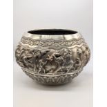 A very large Indian silver bowl, embossed with hunting scenes, 1800g,