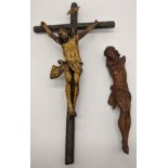 A 19th century wooden carved crucifix together with another carving of Christ, H.32.5cm