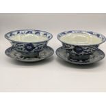 A pair of late 19th/early 20th century Chinese blue and white bowls and saucers, character marks to