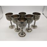A set of six Persian silver goblets, 415g, H.8.5cm