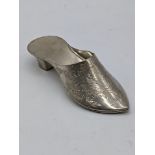 An Oriental silver shoe, 40g, L.10cm