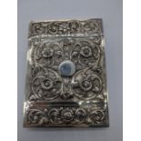 An Indian silver card case, chased scrolling decoration, 116g, 10cm x 7.5cm