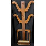 An Arts and Crafts mahogany hall coat and stick stand, early 20th century, H.202cm W.90cm