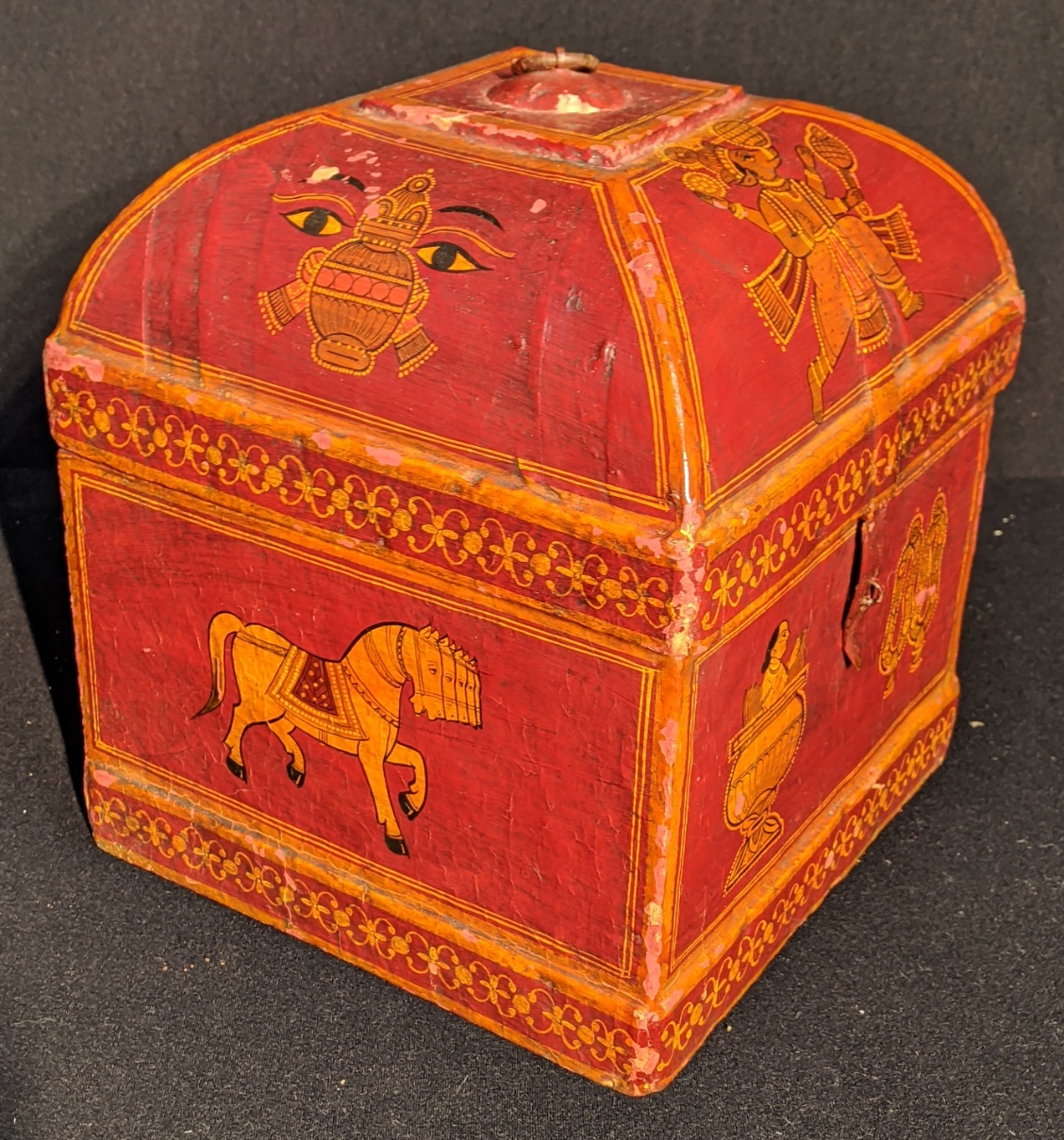An Indian papier mache turban box, red ground depicting gods and animals, H.27cm W.25cm D.25cm - Image 2 of 4
